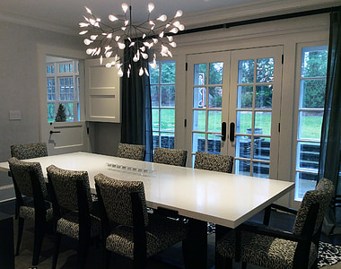 white wooden table with gray padded chairs thumbnail