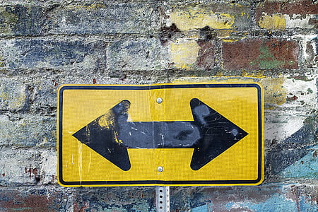yellow and black arrow signage thumbnail