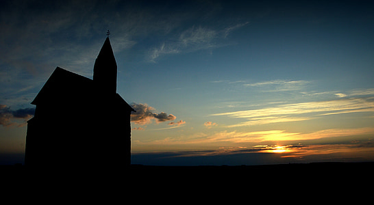silhouette of house during sunset thumbnail