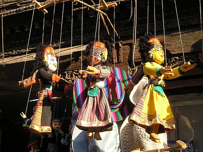 three assorted-color marionettes thumbnail