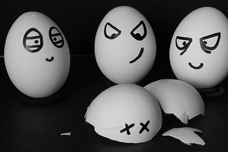 three eggs surrounding broken egg thumbnail