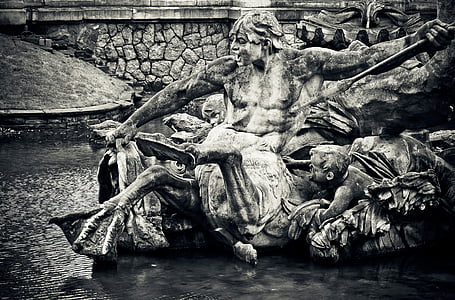 man holding spear statue thumbnail