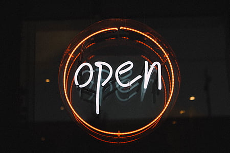 turned-on white and orange Open neon sign thumbnail