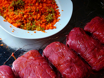 raw meat beside plate thumbnail