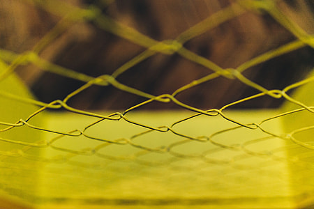 Close-ups of yellow wire netting thumbnail