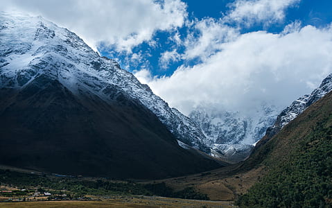 houses beside mountain thumbnail