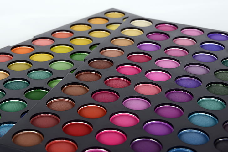 two black paint palettes