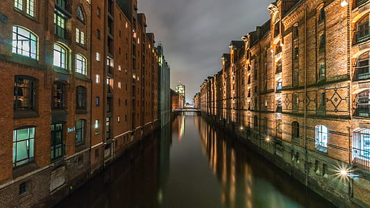 building reflection on body of water thumbnail