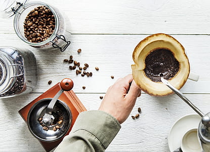 person pouring coffee in mug thumbnail