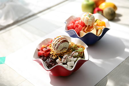 two dessert on top of white wooden surface thumbnail