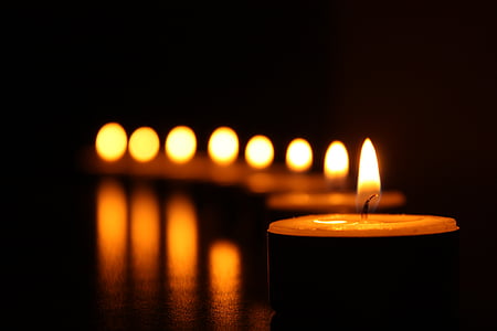 lighted orange tealight candles thumbnail