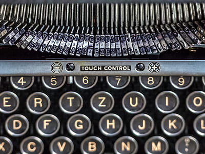 close up photo of gray typewriter thumbnail