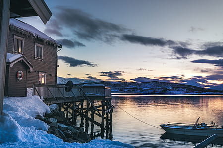 white jon boat on body of water thumbnail