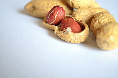almonds on white surface thumbnail