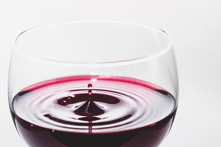 red wine in wineglass closeup photo thumbnail
