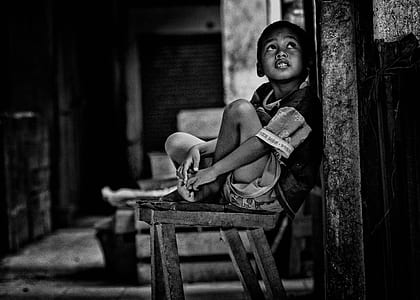 boy sitting on bench thumbnail