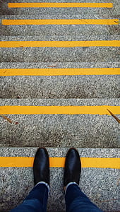person standing near yellow lines thumbnail