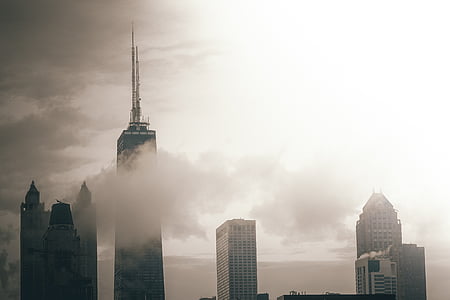tower building surrounded by cloud thumbnail