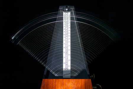 closeup photo of gray and brown measuring tool thumbnail