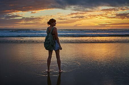 woman walking on beach thumbnail
