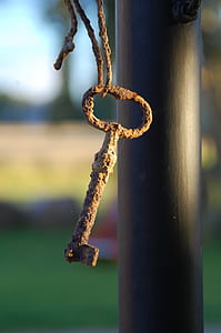 brown metal key thumbnail