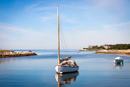 white sailboat on body of water during daytime thumbnail