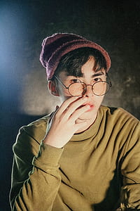man wearing eyeglasses with knit cap thumbnail