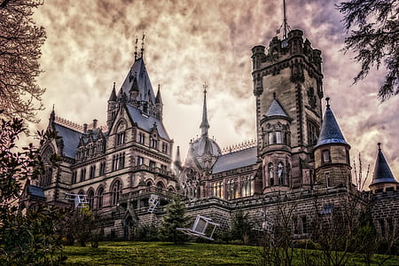 low angel photography of brown mansion thumbnail