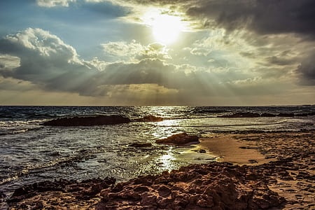 body of water waving under sunrise thumbnail