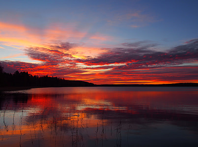 landscape photography of body of water during golden hour thumbnail