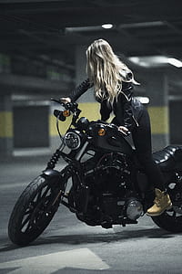 woman riding on black cruiser motorcycle thumbnail
