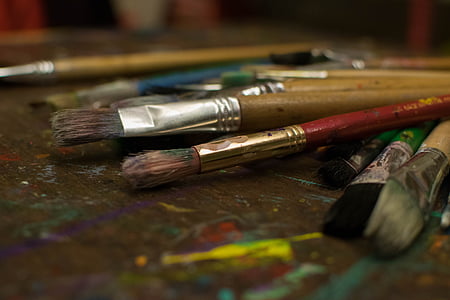 selective focus photography of paint brushes thumbnail