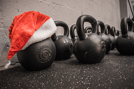 red and white Santa Hat on black kettle bell thumbnail