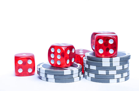 red dice on white surface thumbnail