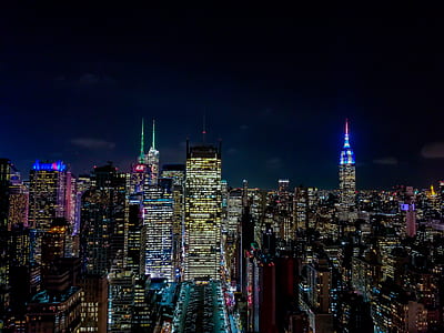 aerial view of city building at nighttime thumbnail