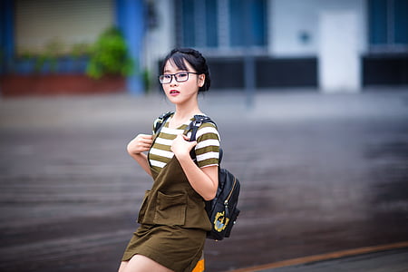 woman wearing brown romper shorts thumbnail