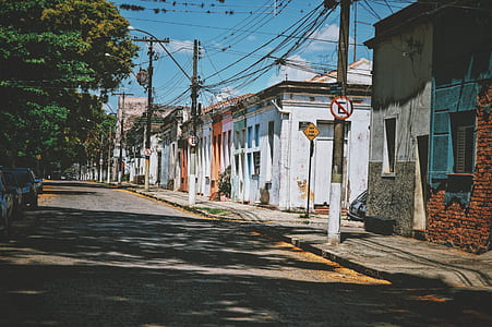 white and gray houses under blue sky during daytime thumbnail