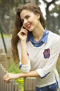 woman wearing gray sweatshirt thumbnail