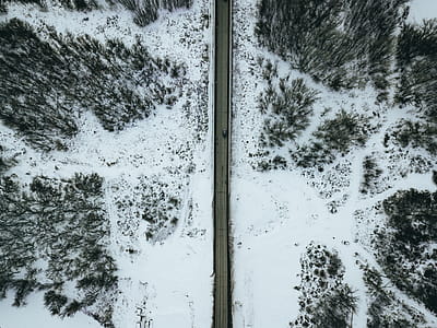 Aerial Photo of Gray Concrete Road during Winter thumbnail