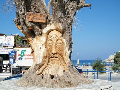 face carved brown tree thumbnail
