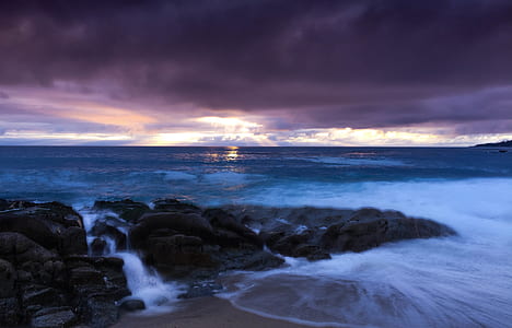 Sea Under Gray Sky during Day Time thumbnail