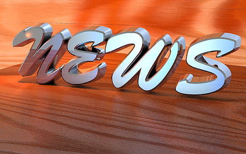 gray News freestanding letters on brown surface thumbnail