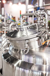 grey stainless steel cap on grey stainless steel container thumbnail