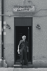 person standing in front of door thumbnail