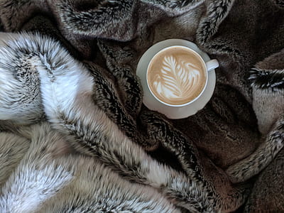 coffee latte in mug on saucer thumbnail