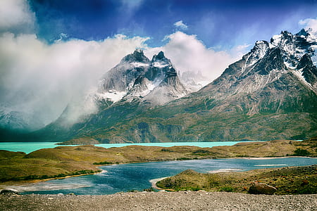 smoky mountain range beside body of water thumbnail