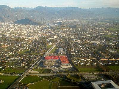 Salzburg seen on takeoff from Salzburg Airport in Austria thumbnail
