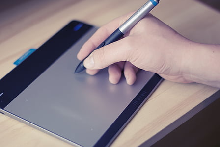 person holding graphics pen thumbnail
