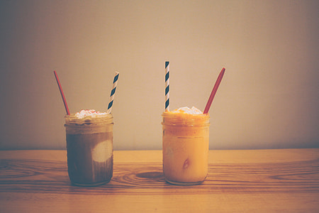 two mason jars with cold drinks thumbnail