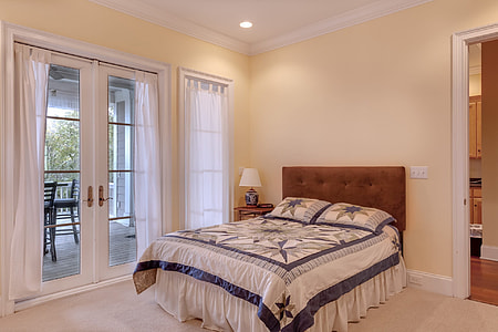 empty bed near doorway thumbnail